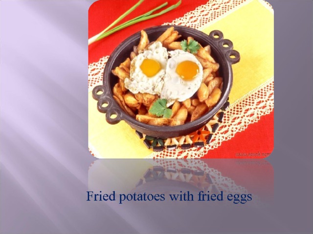 Fried potatoes with fried eggs 